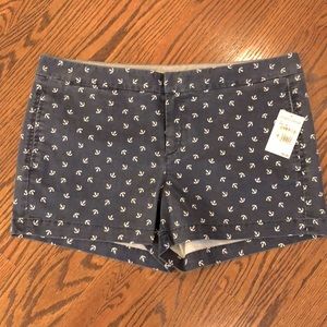 New with tags, hinge brand shorts, navy with white anchor motif. Size 12.
